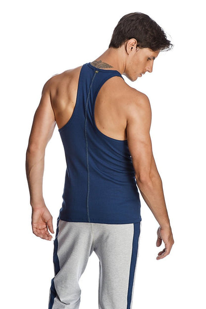 Back view of a navy blue racer-back yoga tank top with a zipper and seam detailing for athletic use
