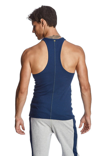 Navy blue racer-back yoga tank with central zipper on back made from breathable fabric for active wear