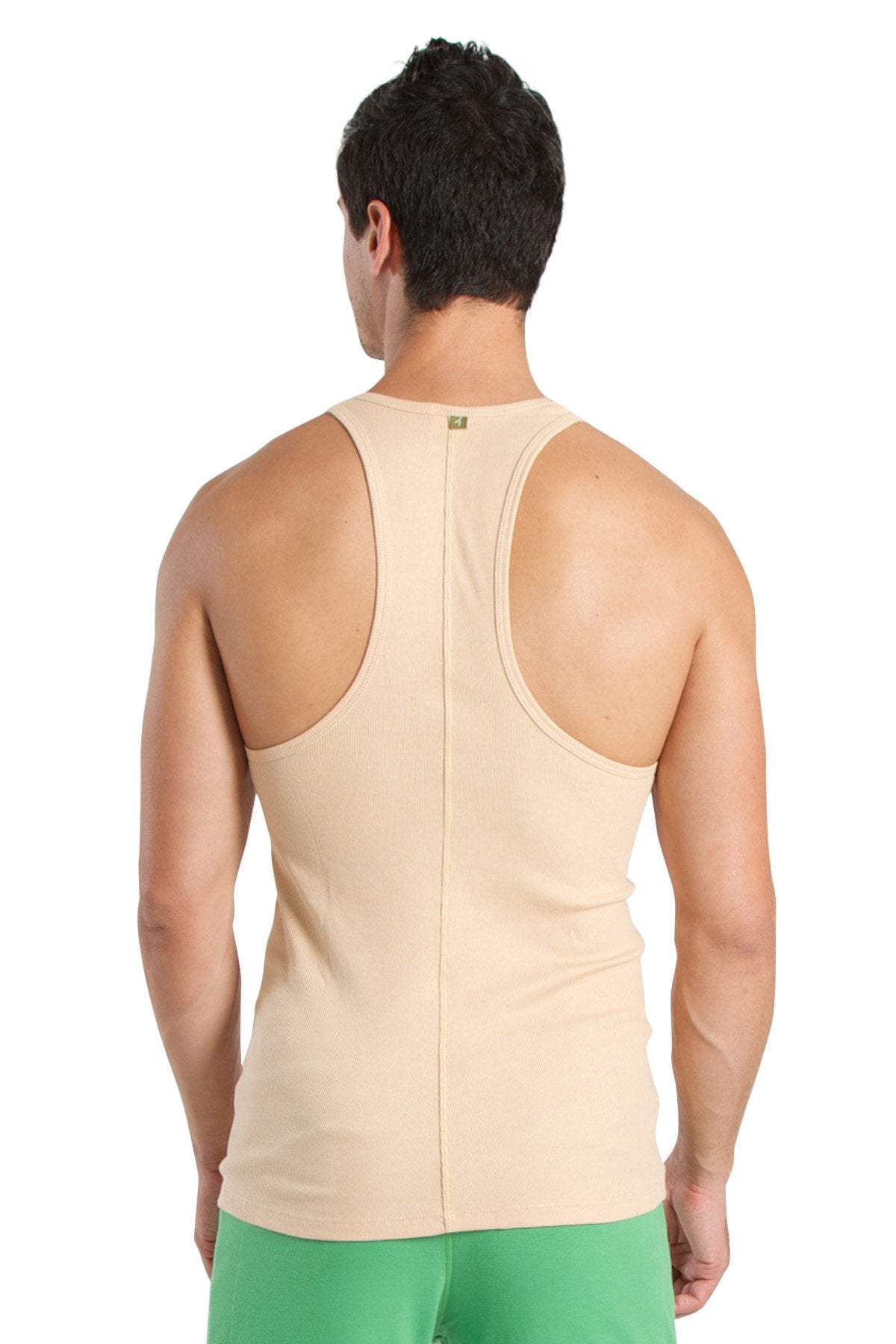 Beige racer-back yoga tank top with central seam and subtle brand tag at neckline for active wear