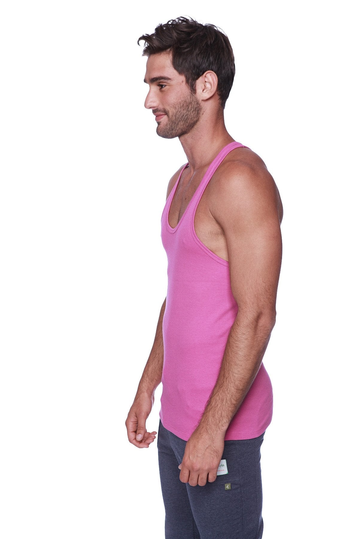 A vibrant berry pink sleeveless racerback yoga tank top made from smooth cotton fabric for comfort