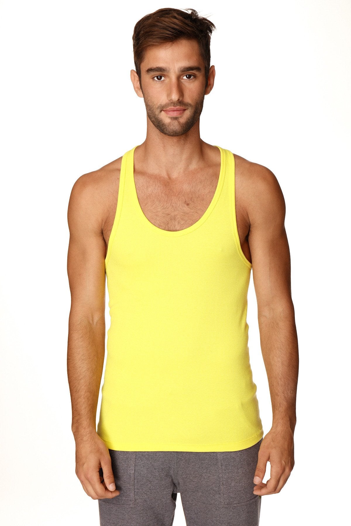 Bright yellow racerback yoga tank top with a simple fitted design ideal for activewear and workouts