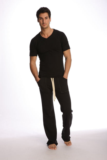 Black cotton joggers with cream-colored drawstrings paired with raglan virtual crew neck in black front view