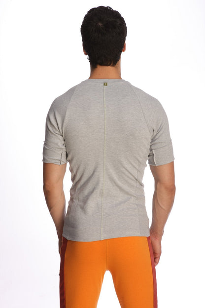 Back view of raglan virtual crew neck gray heathered short-sleeved athletic shirt with central seam