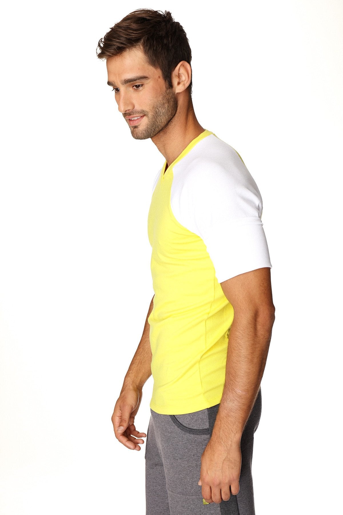 Bright yellow and white raglan sleeve athletic crew neck tee ideal for activewear and casual use