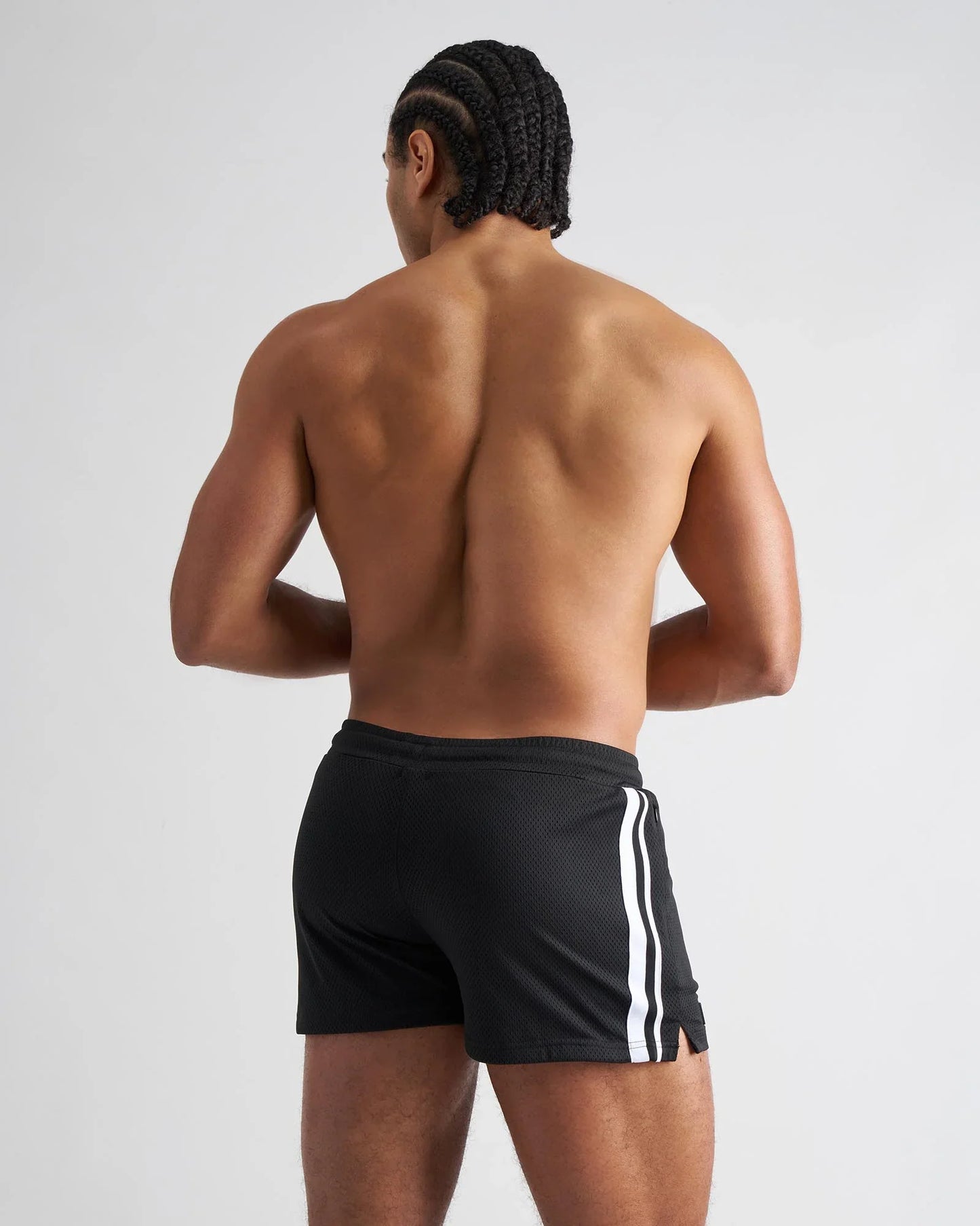 Black s.s.c. fraternity 3 inch mesh athletic shorts with two vertical white stripes along the side