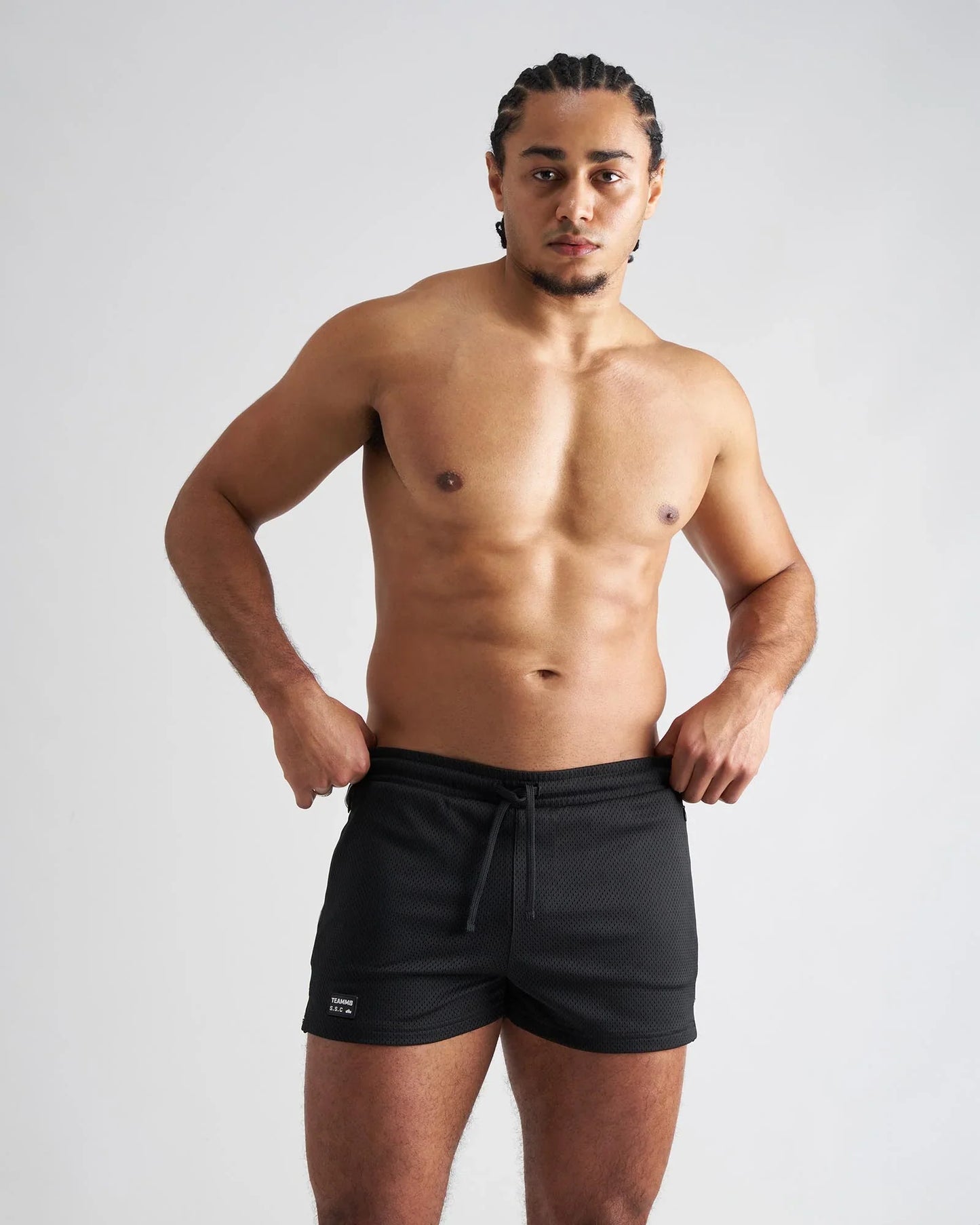 Black mesh s.s.c. fraternity 3 inch athletic shorts with drawstring waistband and logo on lower left leg