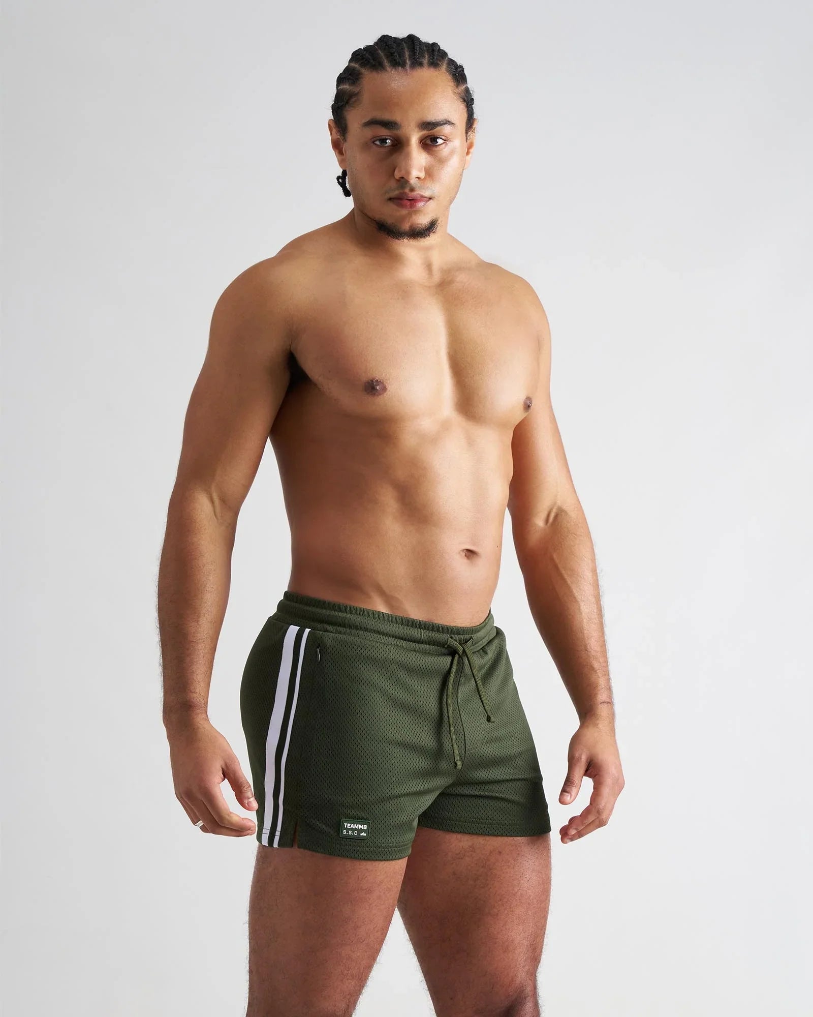 Olive green s.s.c. fraternity 3 inch mesh athletic shorts with white side stripes and a drawstring waistband