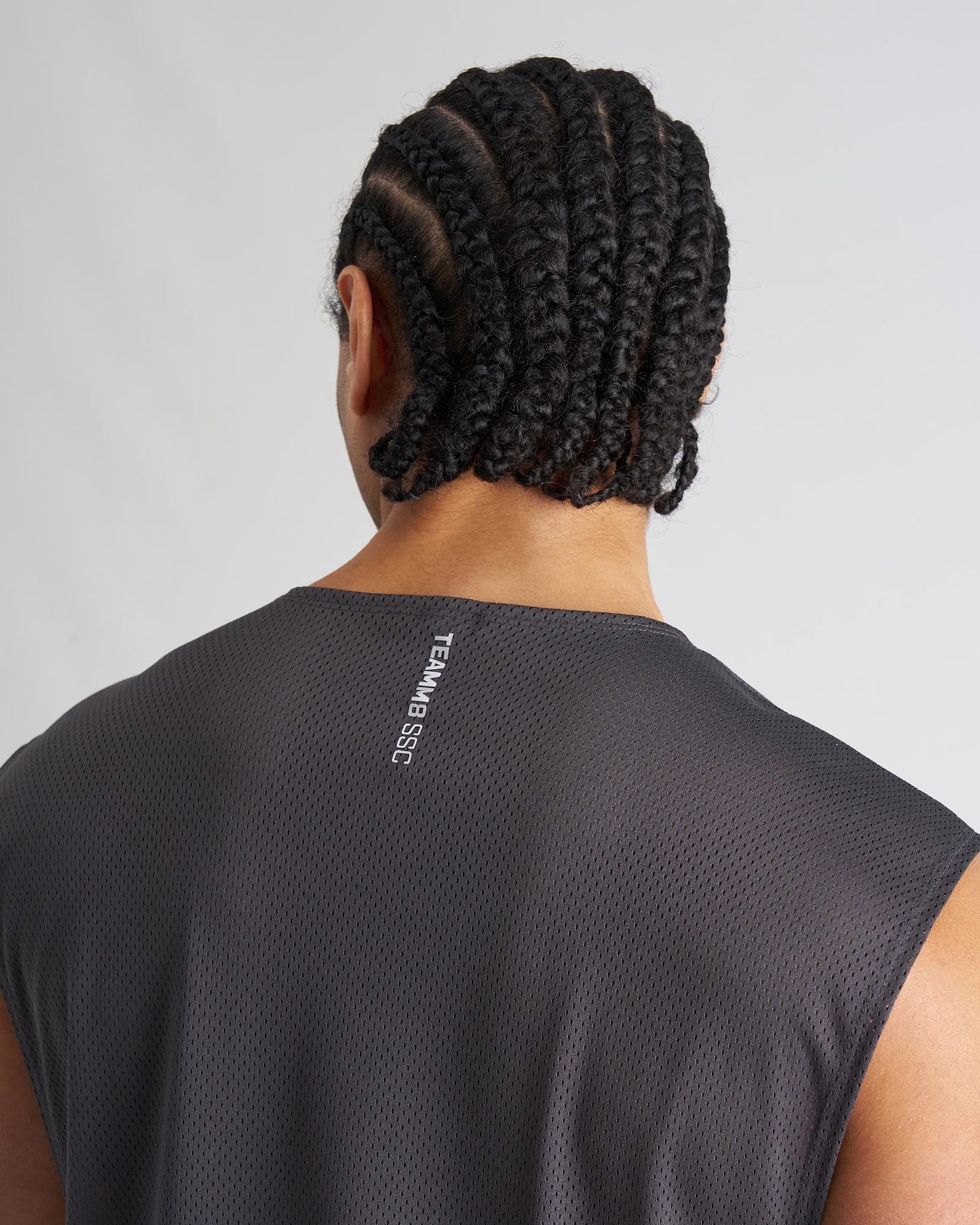 Dark gray mesh sleeveless s s c muscle tank showing back side with team b ssc branding on neck