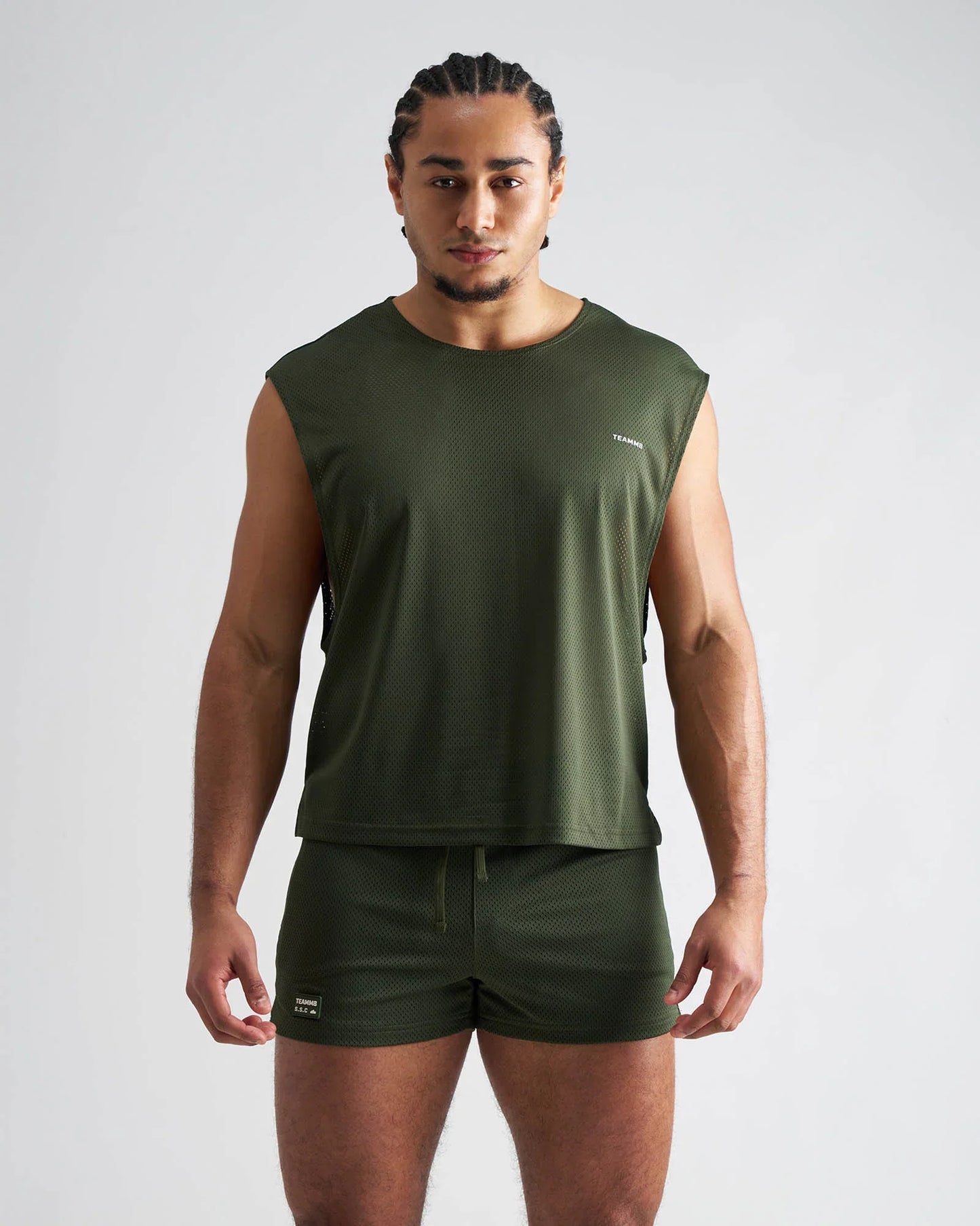 Olive green sleeveless mesh athletic top s.s.c. mesh muscle tank designed for breathability and active wear