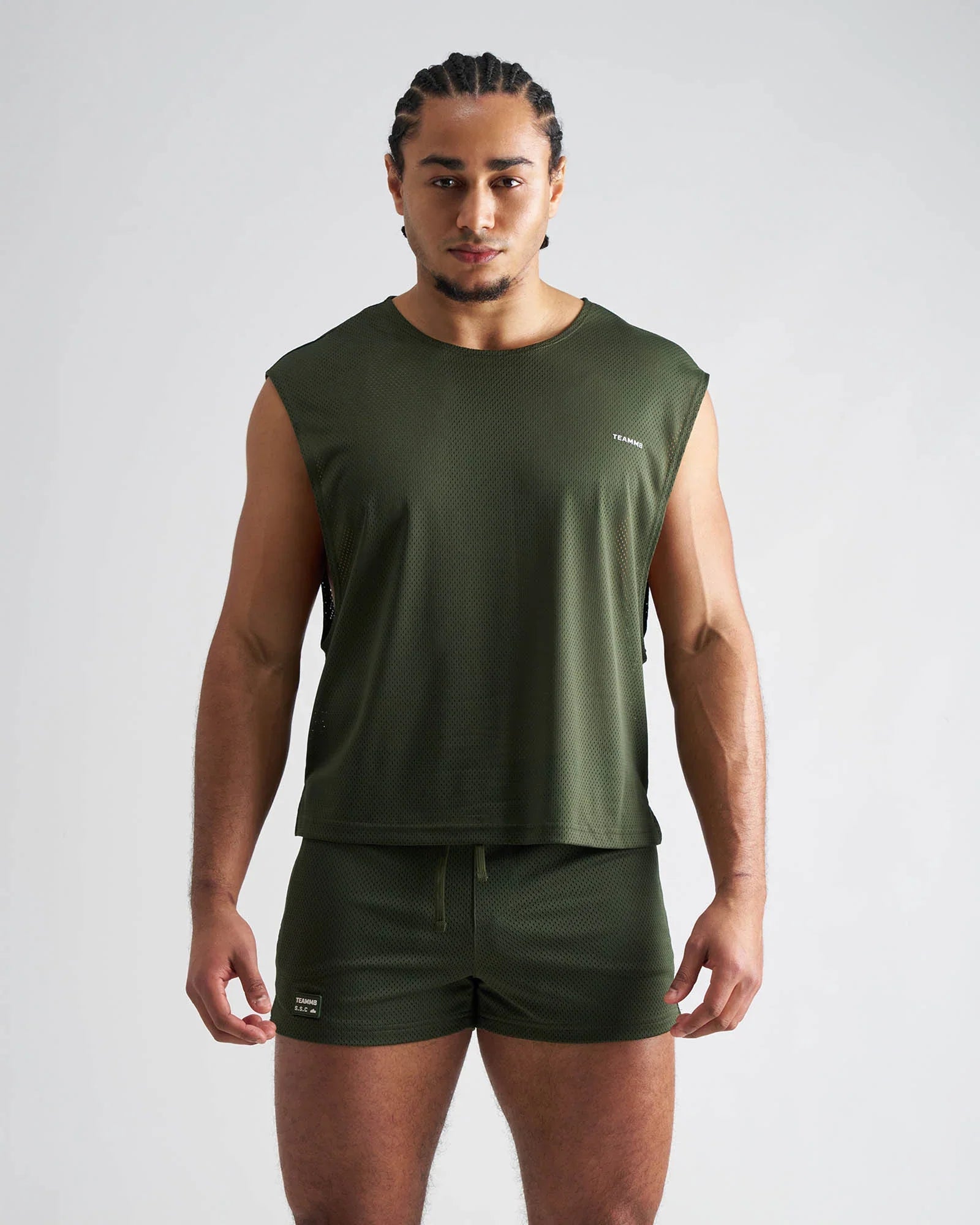 Olive green sleeveless mesh athletic top s.s.c. mesh muscle tank designed for breathability and active wear