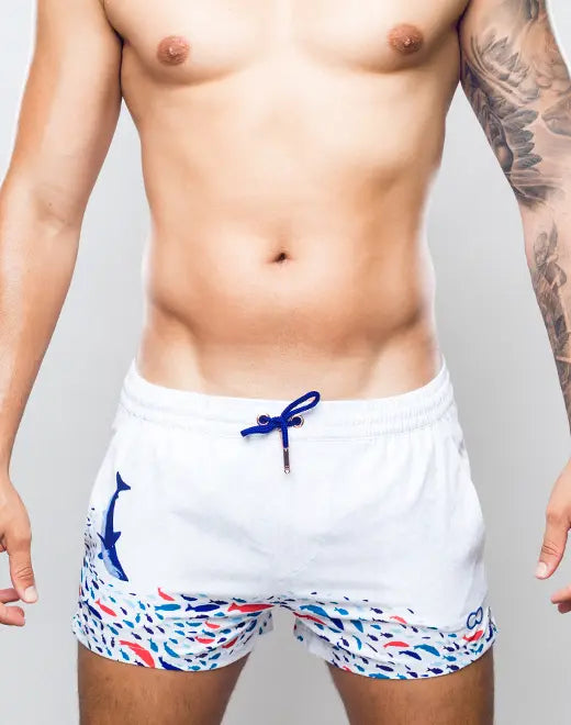 White swim trunks s50 seascape print swim short with blue whale graphic colorful fish pattern and navy drawstrings