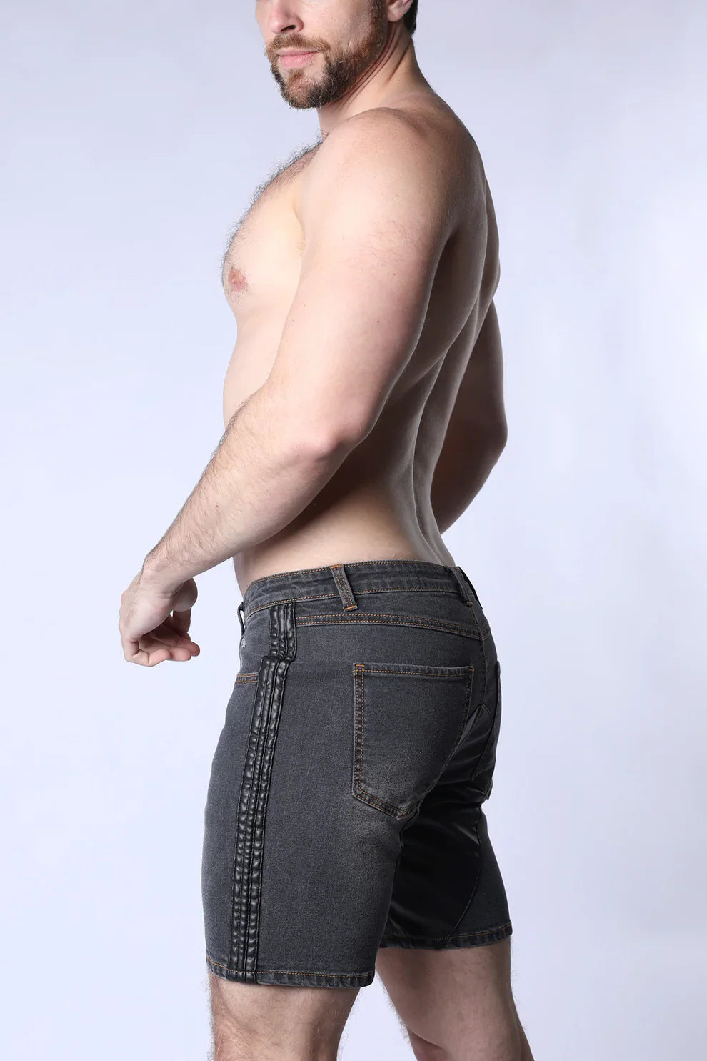 Dark gray saddleback denim shorts with slim fit and contrasting side stitching in durable denim material