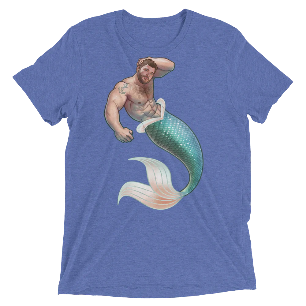 Blue heathered t-shirt featuring a muscular bearded merman with teal and white scaled tail from salt of the sea design
