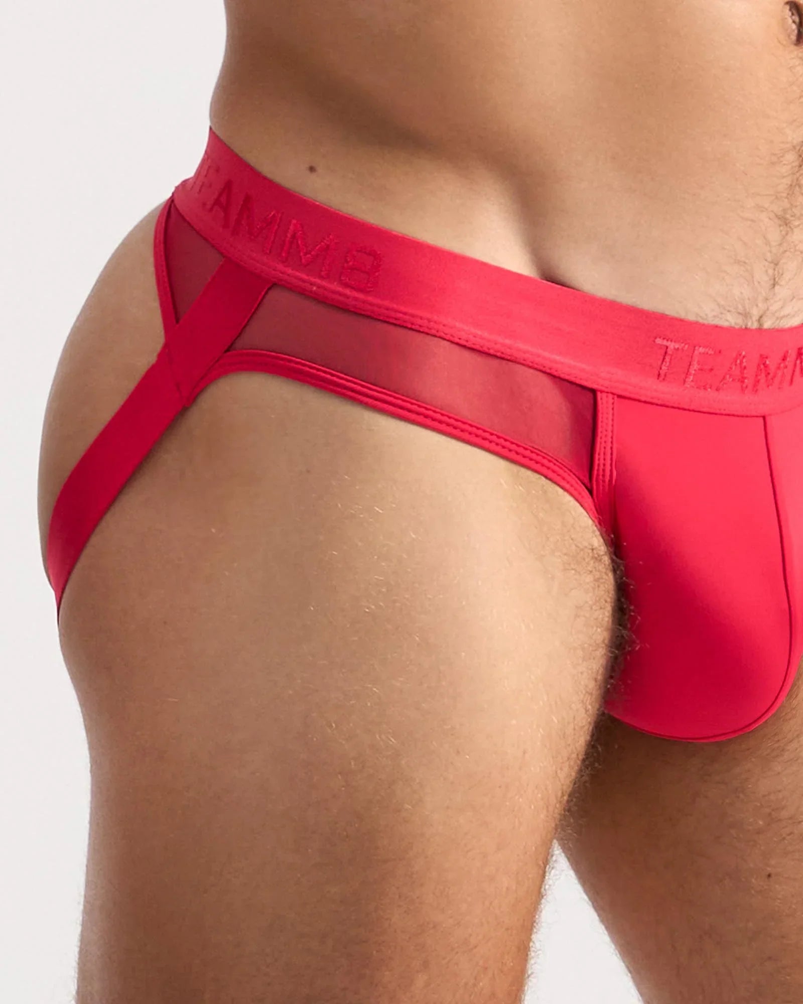 Score sheer jock vibrant red briefs with sheer mesh trim and bold elastic waistband featuring team logo