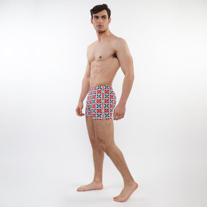 Men’s seersucker swim shorts with mesh lining in red blue and white geometric pattern for beachwear