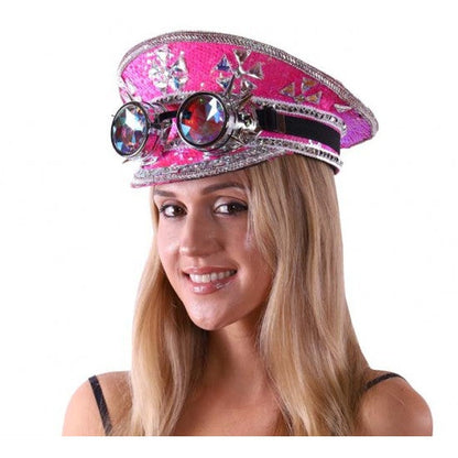 A vibrant pink steampunk festival hat with silver embellishments and ornate goggles on the front