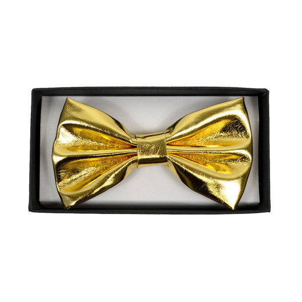 A shiny gold metallic bow tie displayed in a black gift box from silver or gold bow tie collection