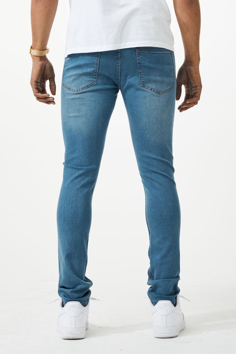 Blue skinny fit denim jeans with a slim fit and classic five-pocket design made from denim material