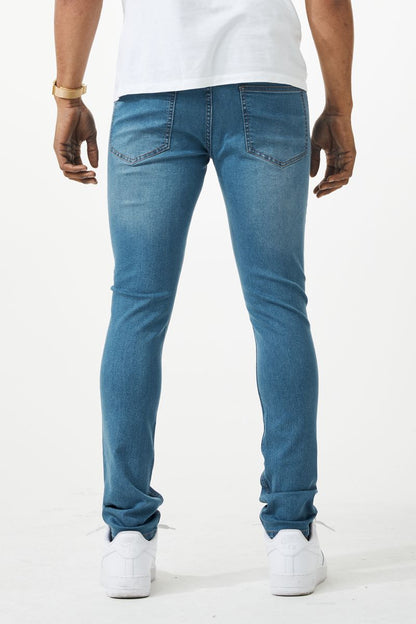 Blue skinny fit denim jeans with a slim fit and classic five-pocket design made from denim material