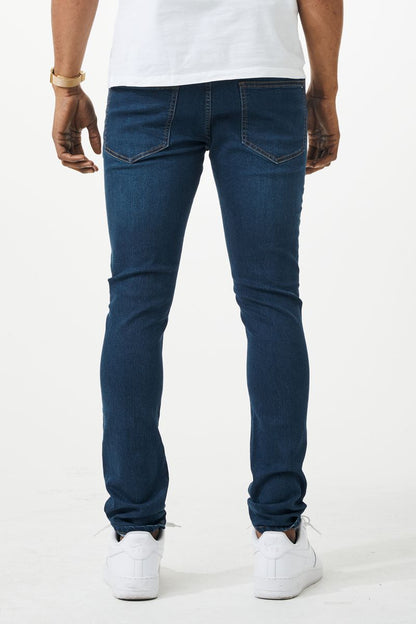 Dark blue skinny fit denim jeans with a slim fit and classic five-pocket design made from denim material