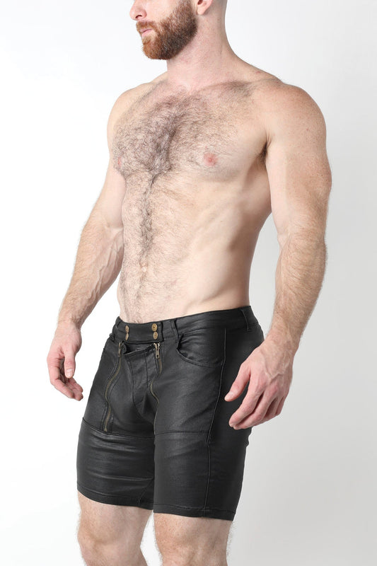 Black leather slick carpenter zipper shorts with gold-tone buttons and zipper details for a stylish look