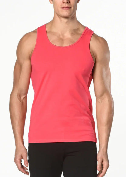 A vibrant coral solid stretch jersey tank top with a sleeveless design and smooth fabric perfect for casual wear