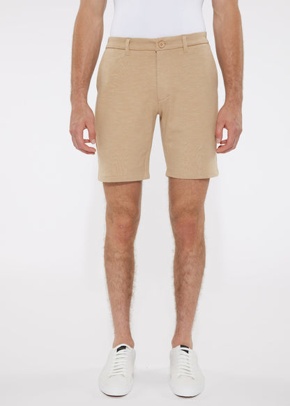 Beige solid stretch knit chino shorts with button closure and belt loop detail for casual wear