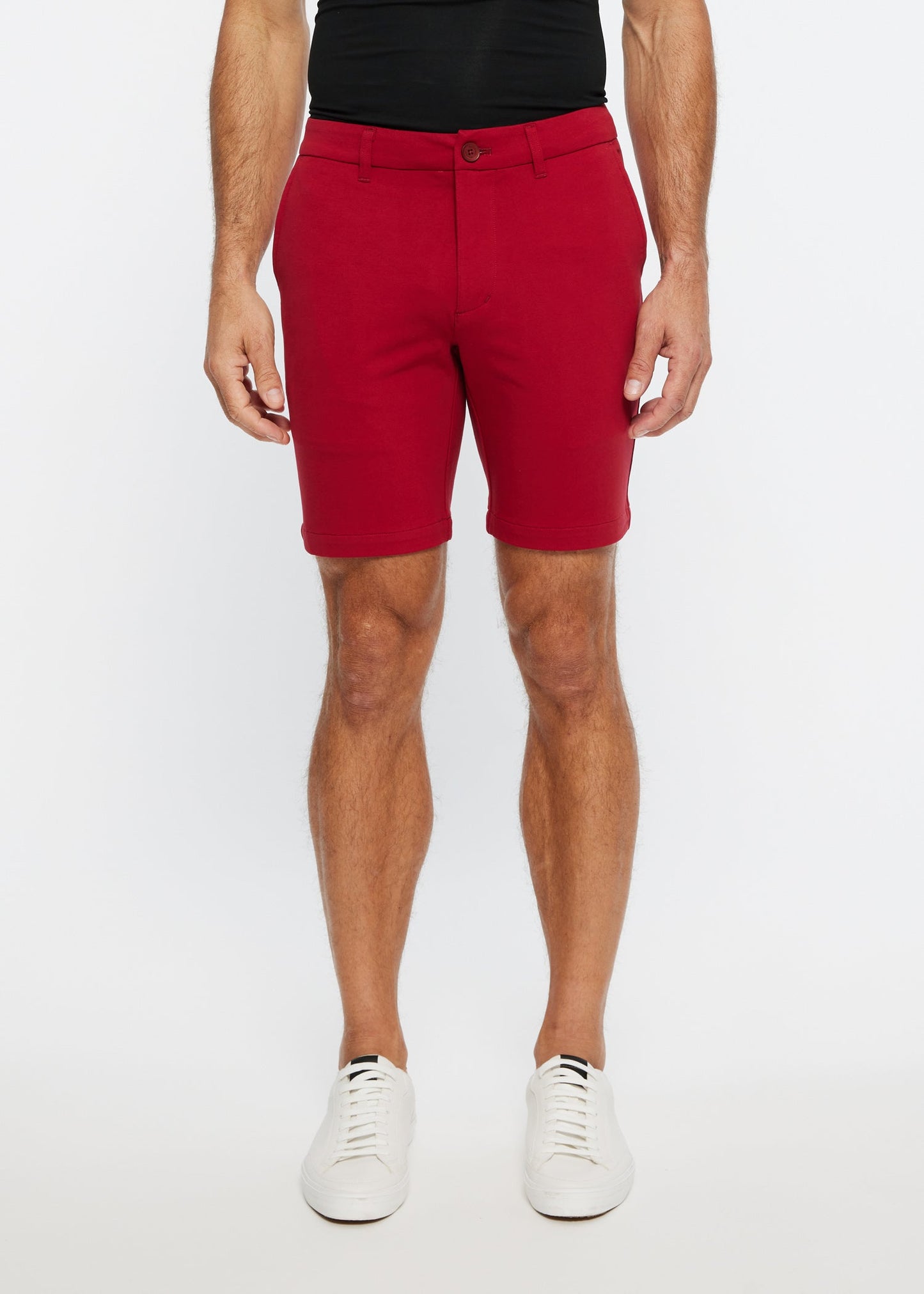Red men’s solid stretch knit chino shorts with tailored fit and button closure for casual wear