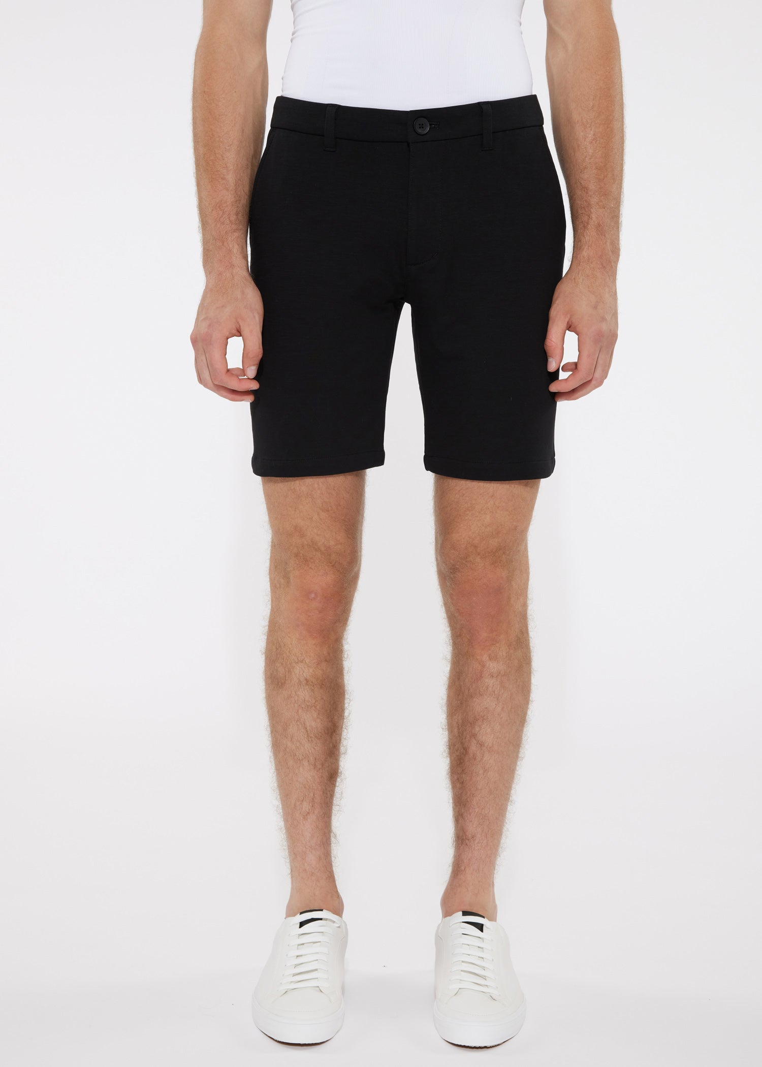 Black solid stretch knit short tailored chino shorts with modern cut and subtle stitching details