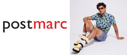 Man wearing a sorona v-neck tee with floral short-sleeved shirt and blue shorts paired with yellow and black sandals