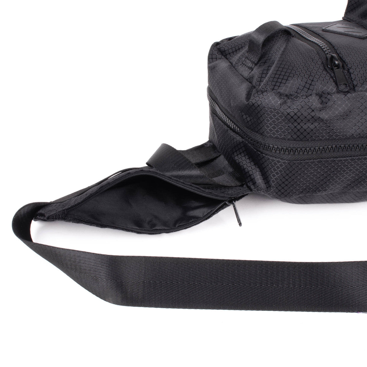 Sport crossbody sling bag in black mesh pattern with wide adjustable strap and multiple zippered compartments