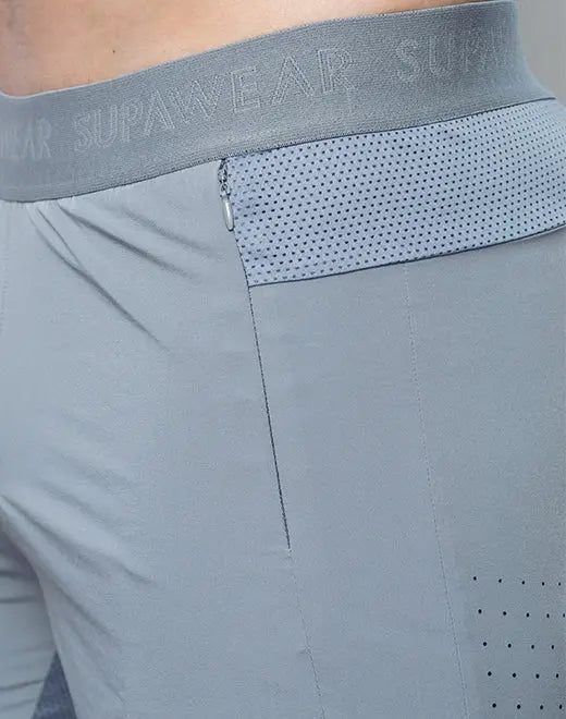 Gray spr flex athletic shorts with perforated mesh panel and elastic waistband featuring supawear logo