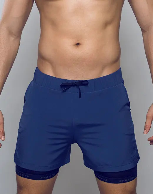 Navy blue SPR MAX SHORT athletic shorts with drawstring waistband and contrasting black hem trim for active wear