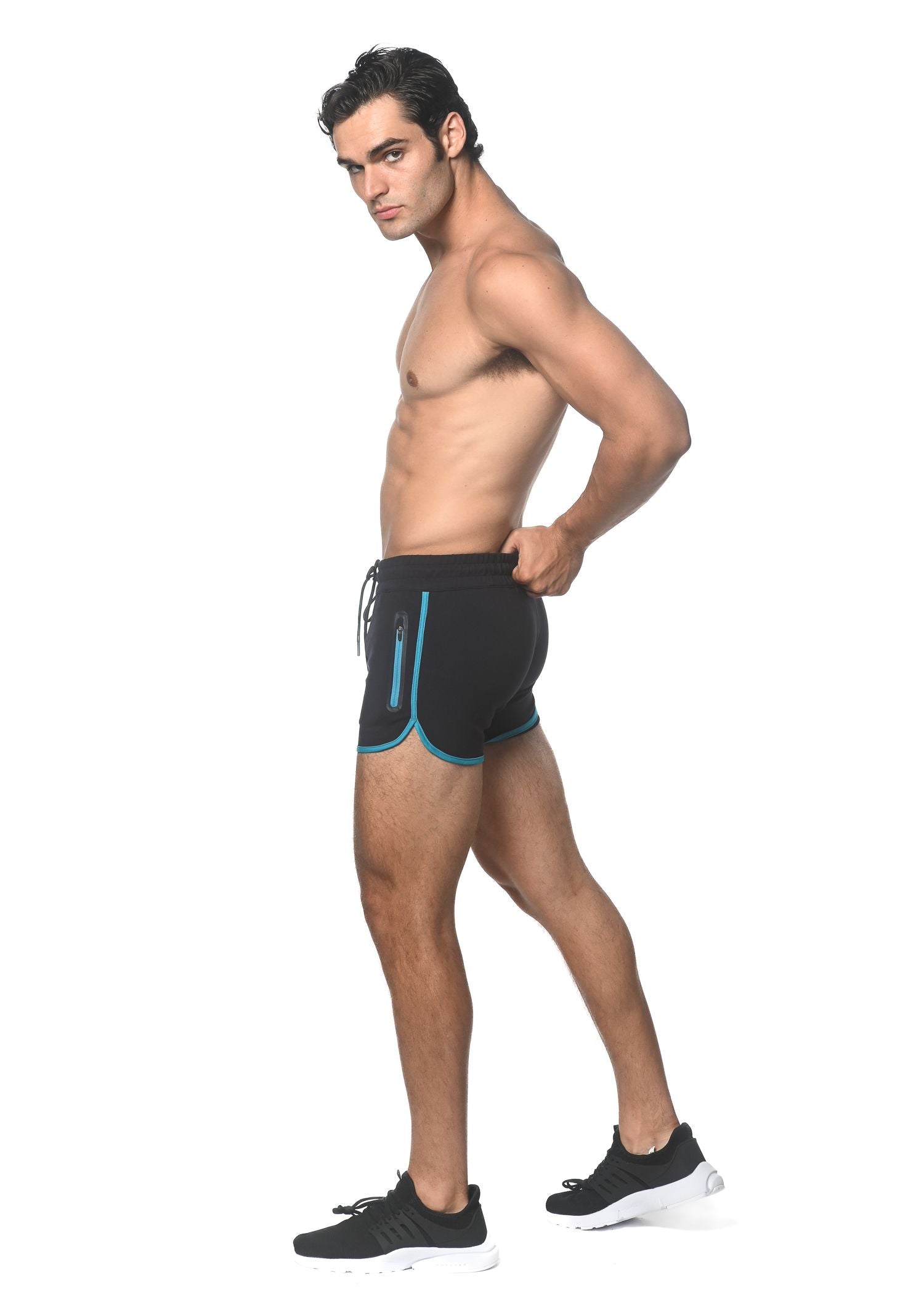 Black sprinter stretch gym shorts with teal trim and heat weld side zipper pockets for athletic use