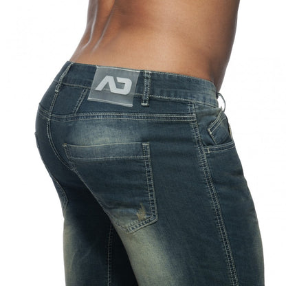 Dark wash squat bermuda jeans with sleek modern design contrasting stitching and branded patch on back waistband
