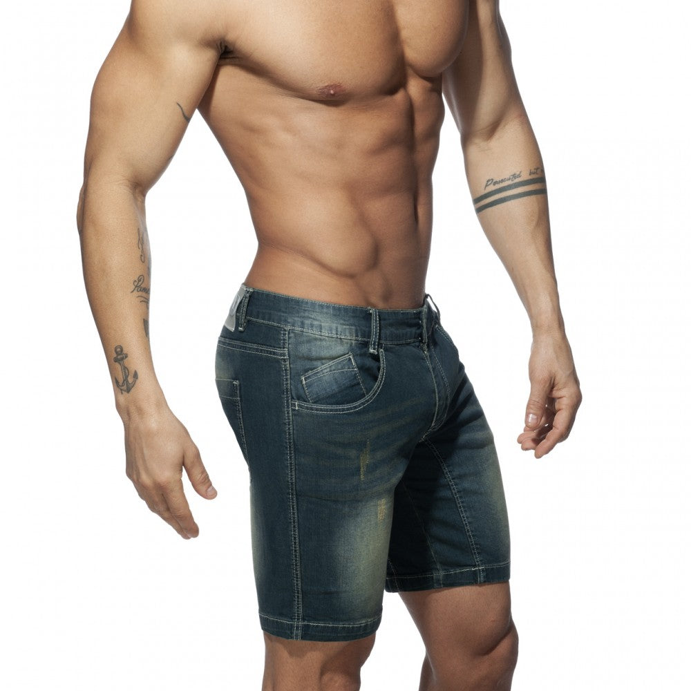 Dark blue denim squat bermuda jeans shorts with faded wash and visible stitching for casual wear