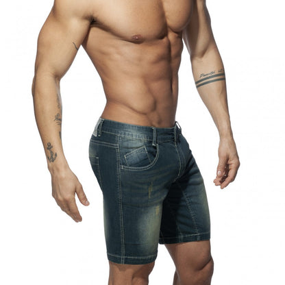 Dark blue denim squat bermuda jeans shorts with faded wash and visible stitching for casual wear