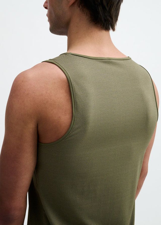 Rear view of a person wearing an army green textured stretch mesh performance tank top.