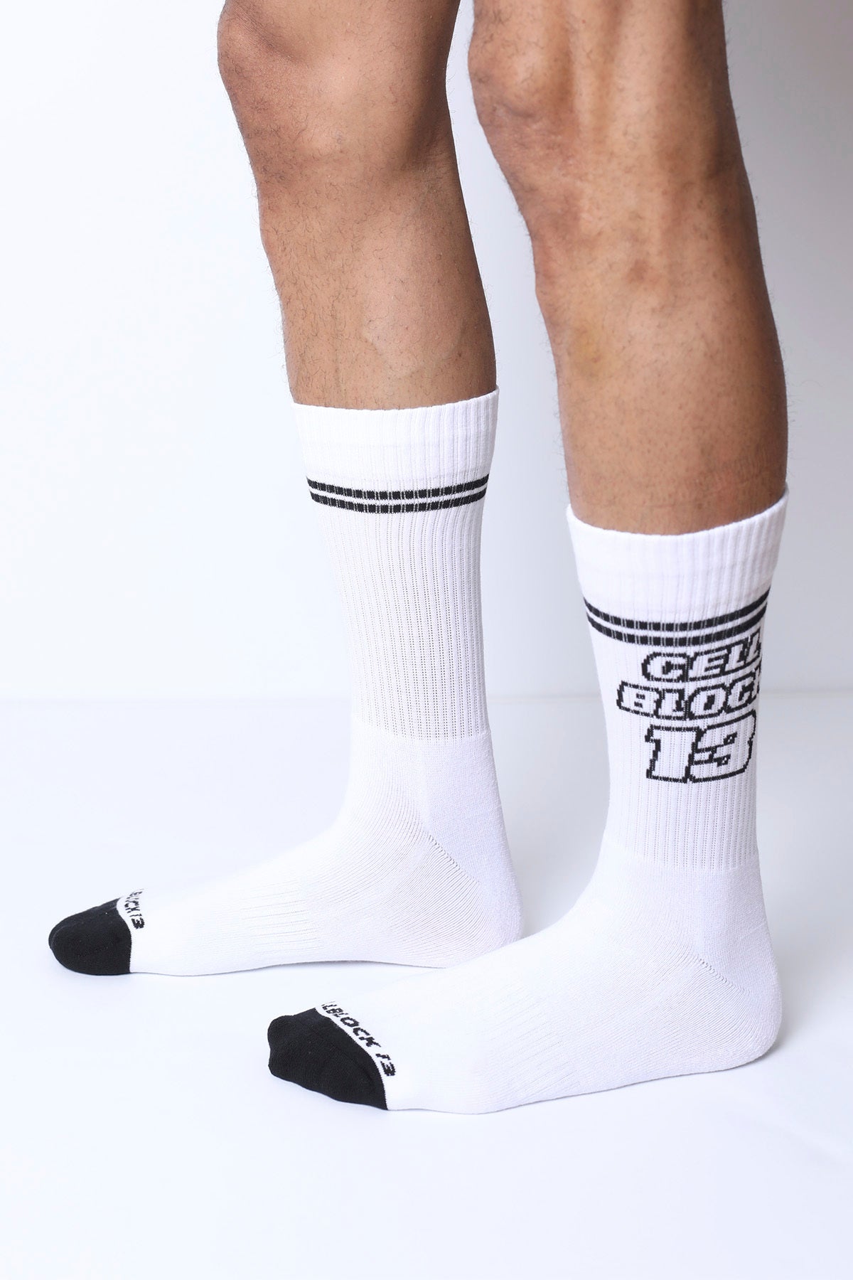 Starter crew socks white athletic socks with black toe caps two stripes and bold cell block 13 graphic