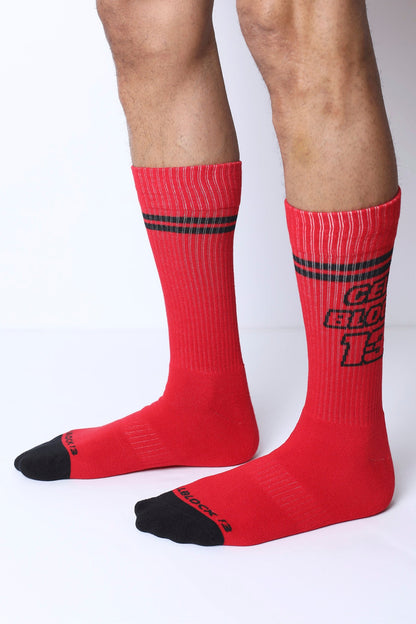 Starter crew socks in red with black toe caps and two stripes featuring bold cer block 15 graphic in black lettering