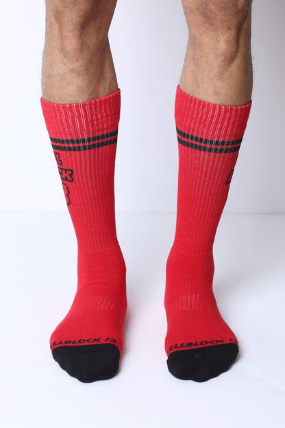 Starter crew socks in red with black toe caps and stripes featuring shellblock 13 logo for athletic use