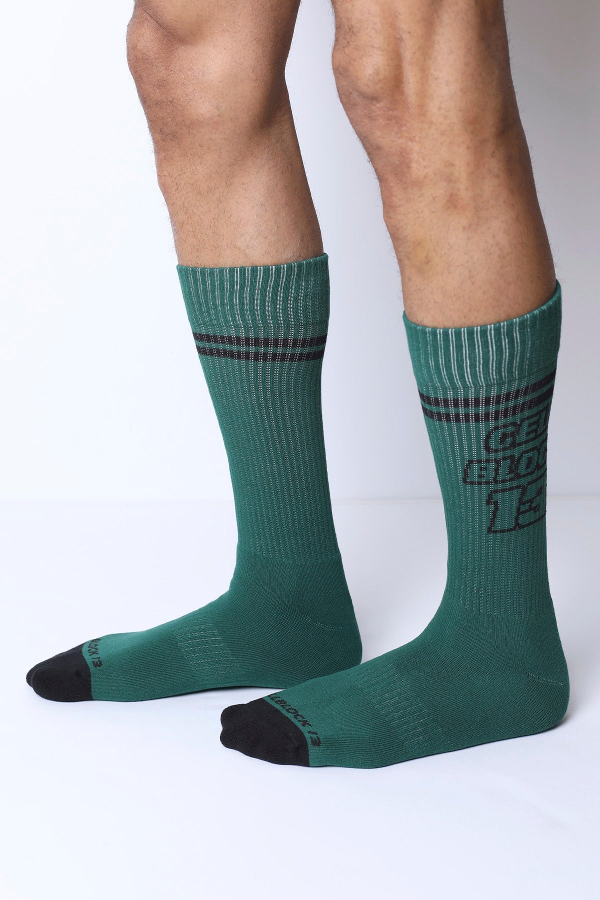 Starter crew socks in dark green with black stripes bold graphic print and reinforced toe caps for durability
