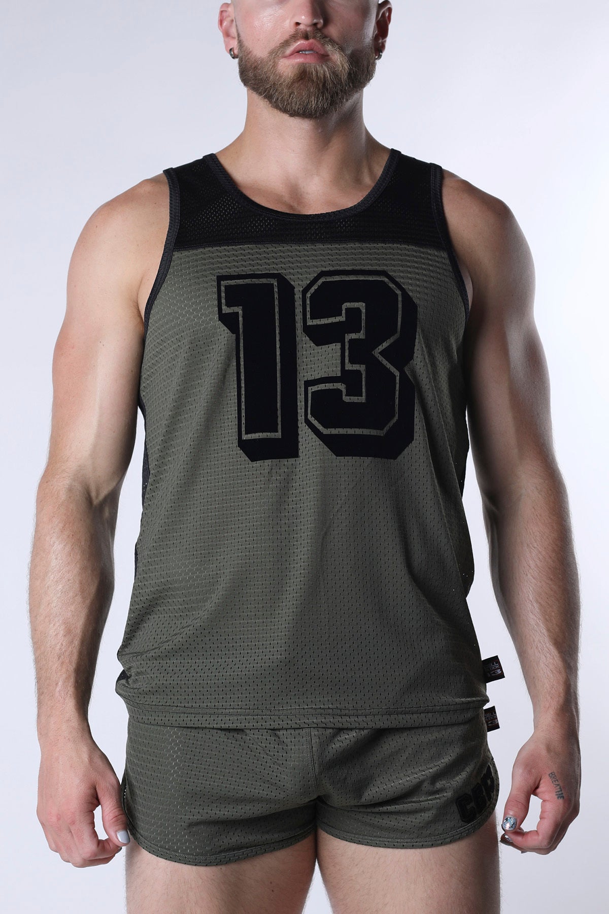 Olive green starter mesh tank top with black number 13 and matching shorts in breathable athletic fabric