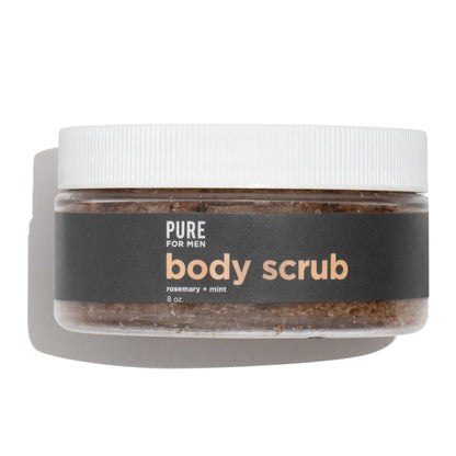 A clear jar with a white lid contains brown granular body scrub labeled pure for men stay ready scrub