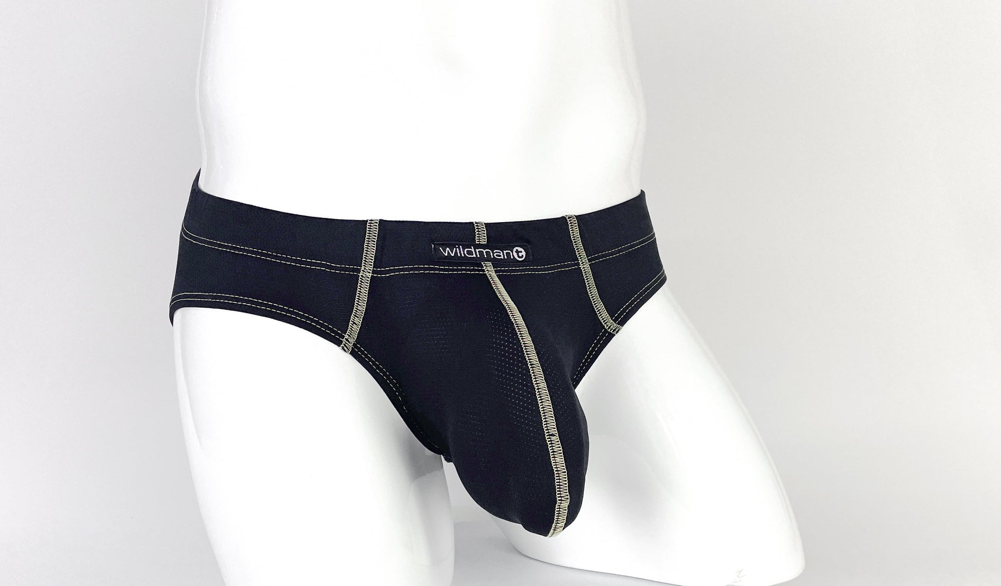 Black Stitch Big Boy pouch brief on a mannequin with contrasting light stitching and a WildmanT logo patch.