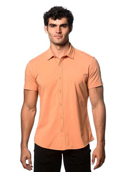 A sleek peach-colored stretch knit short-sleeved button-up shirt with a classic collar and tailored fit