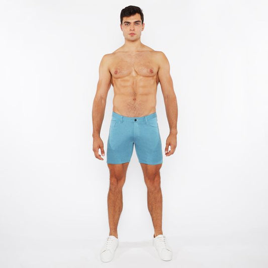 A pair of light blue stretch knit shorts with a form-fitting modern design for comfortable active wear