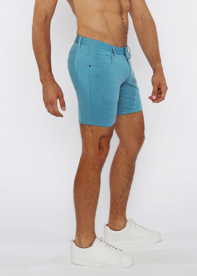 A pair of men’s stretch knit shorts in light blue with tailored fit and visible stitching details
