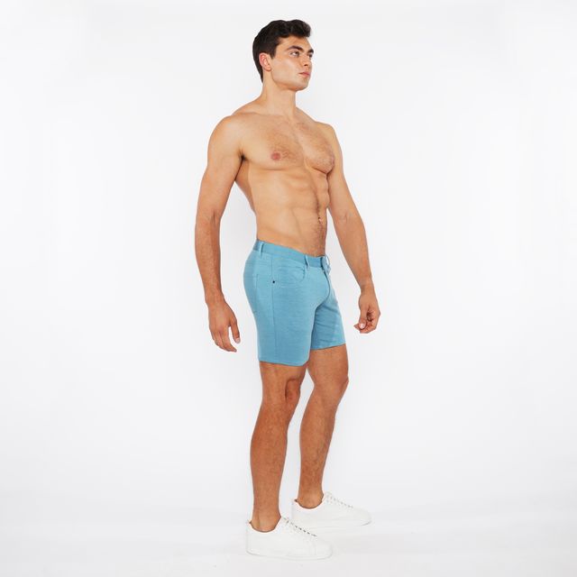 Light blue stretch knit shorts with five-pocket design and belt loops for comfortable casual wear