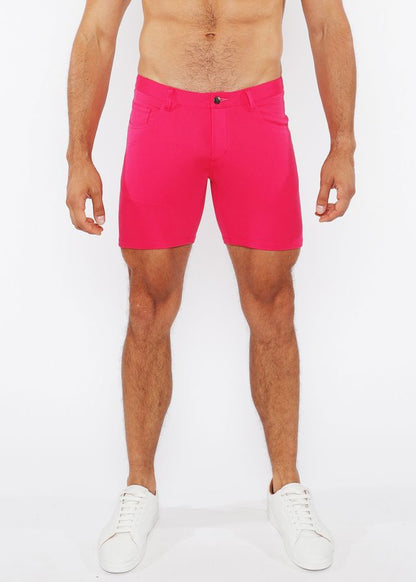 Bright pink stretch knit shorts for men with a tailored fit and single button closure